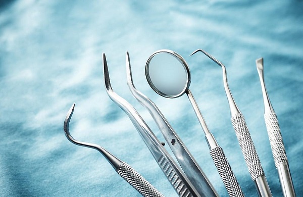 A Set of metal medical dental equipment tools for dental surgery.